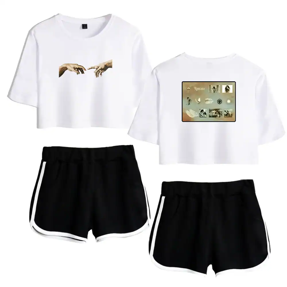 Fashionable white cropped T-shirts with artistic graphic prints, paired with sporty black shorts with white trim, perfect for casual or athletic wear.