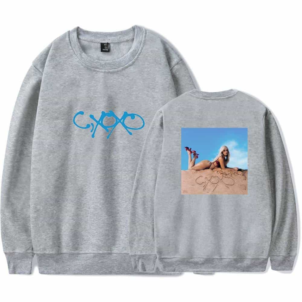 Casual grey sweatshirt featuring Camila Cabello's logo and a photo of her lying on the sand at the beach.