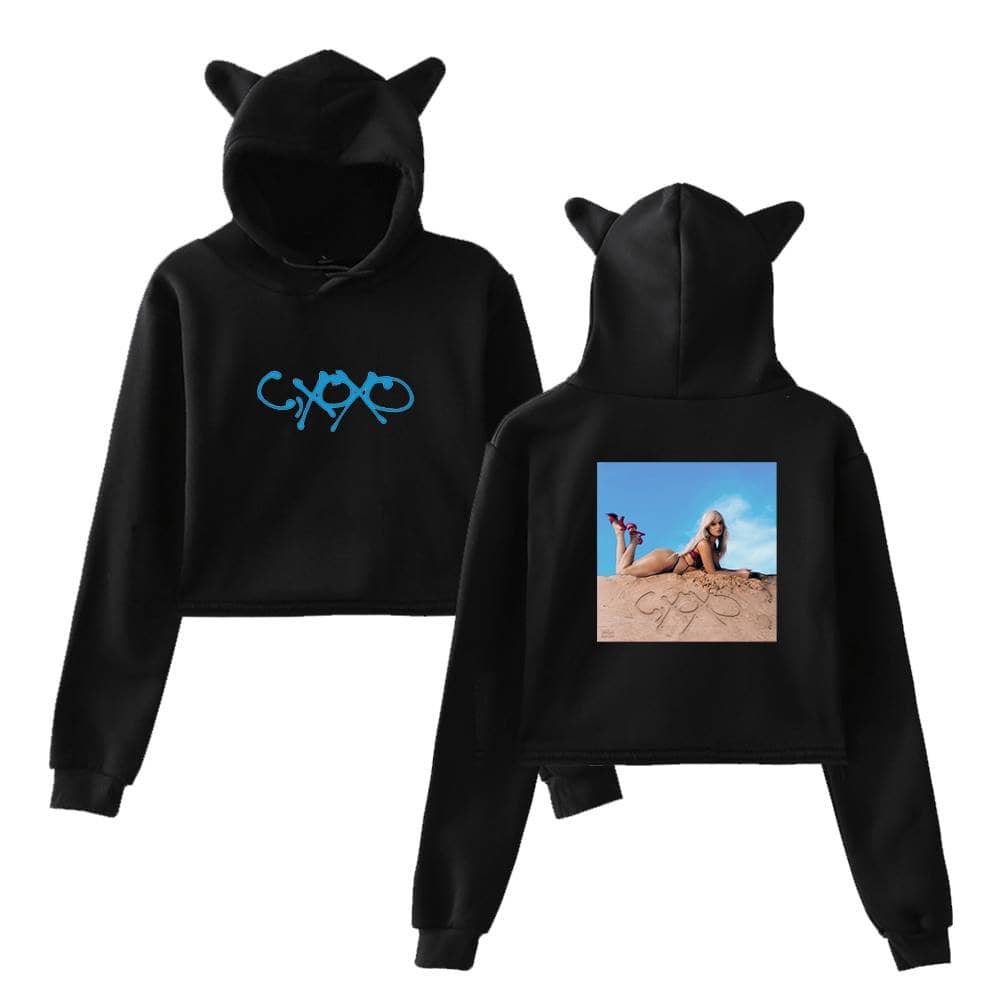 Cute black hoodie with "CYO" graffiti print and a graphic of Camila Cabello lying on the sand on the back, featuring playful cat ears on the hood.