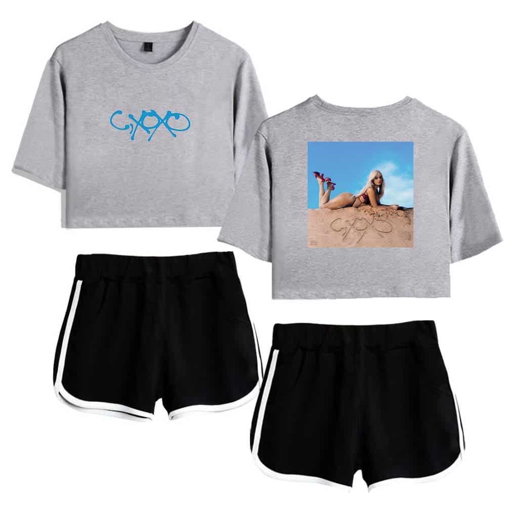 Casual gray cropped sweatshirt with blue graphic logo and a graphic tee featuring Camila Cabello lounging on the sand with a bright blue sky background.