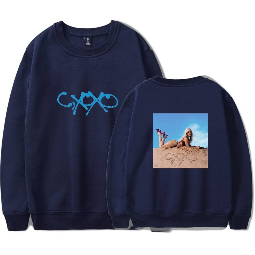 Camila Cabello sweatshirt with her signature logo and a photo of her lying on the sand wearing sunglasses and a swimsuit.